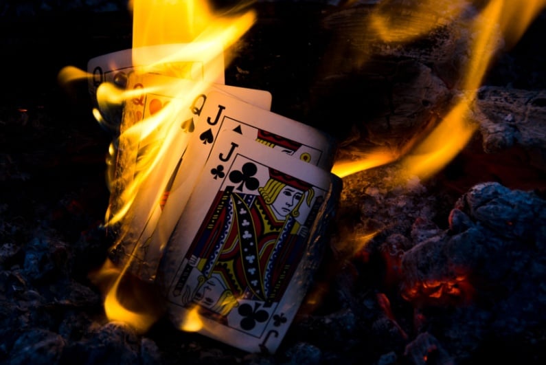 Burning playing cards