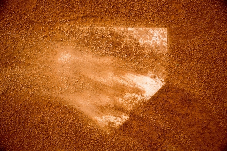Home plate covered in dirt