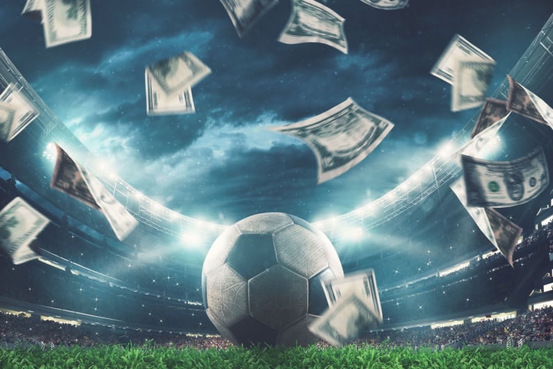 Soccer ball surrounded by floating cash