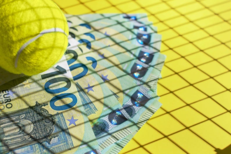 Tennis ball and Euro notes