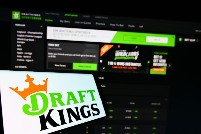 DraftKings on phone and PC monitor