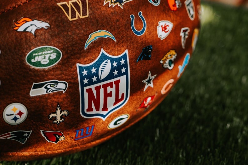 NFL ball with badges