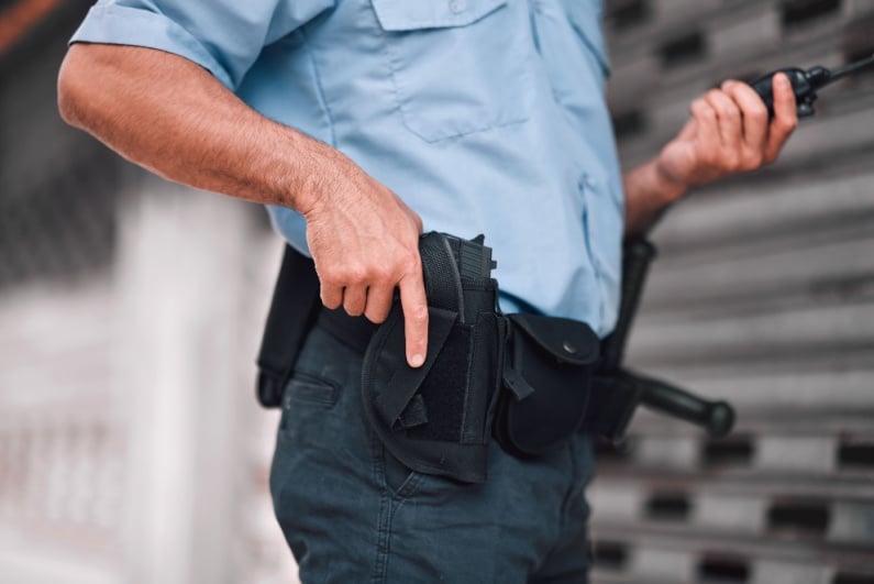 Security guard with handgun