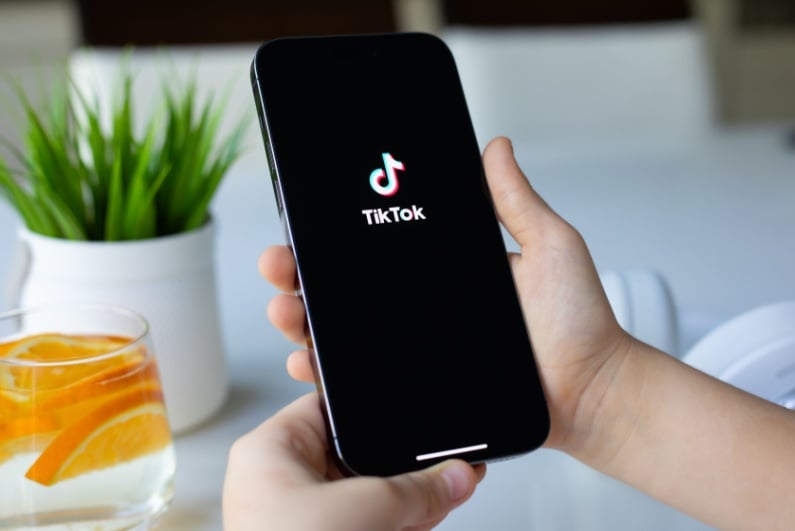 TikTok logo on phone