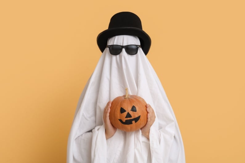 Ghost holding pumpkin