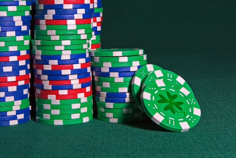 Poker chip with four leaf clover