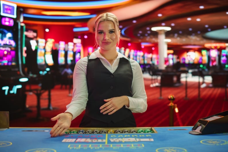 Female casino game dealer