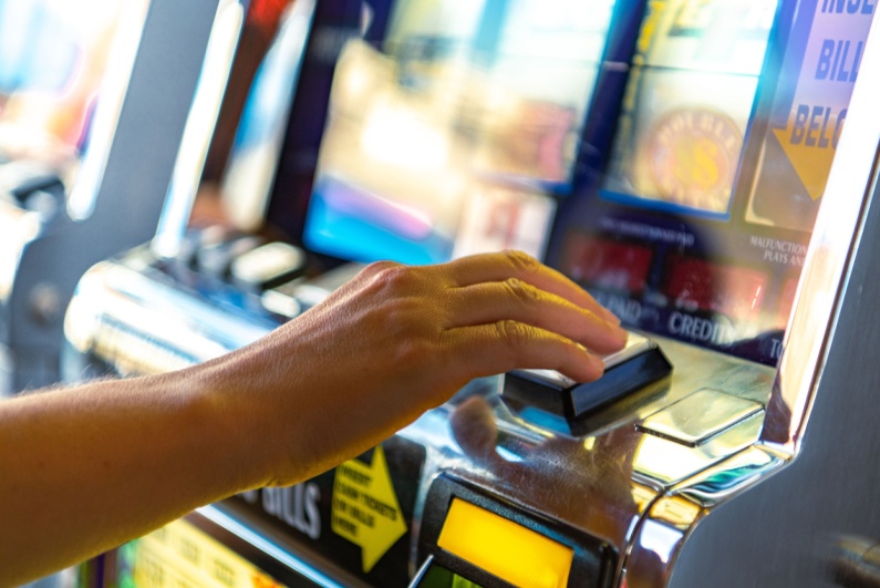 Person playing slot machine