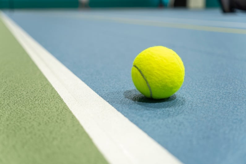 Tennis ball on court