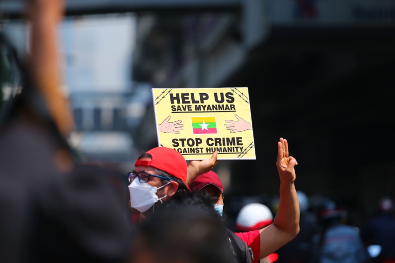 Protestor holding Free Myanmar sign