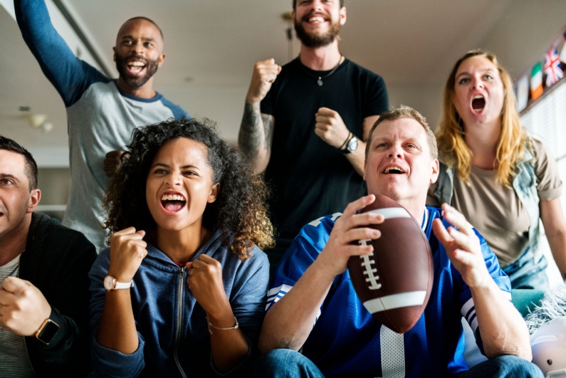 Fans watching football