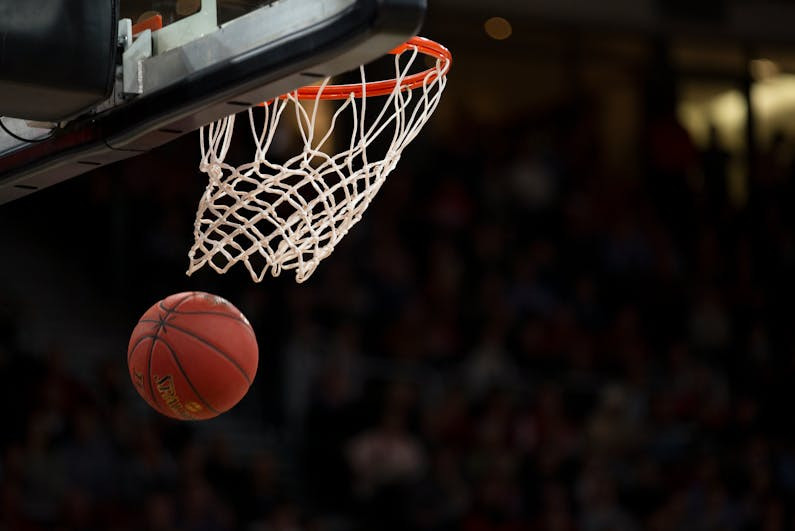 Basketball going through net