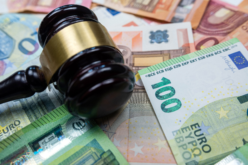 Gavel on top of Euro banknotes