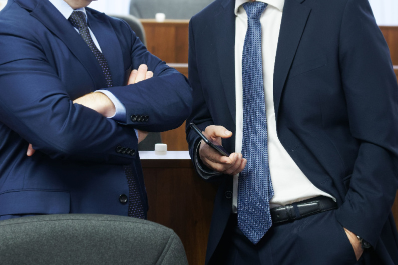 Men in suits talking